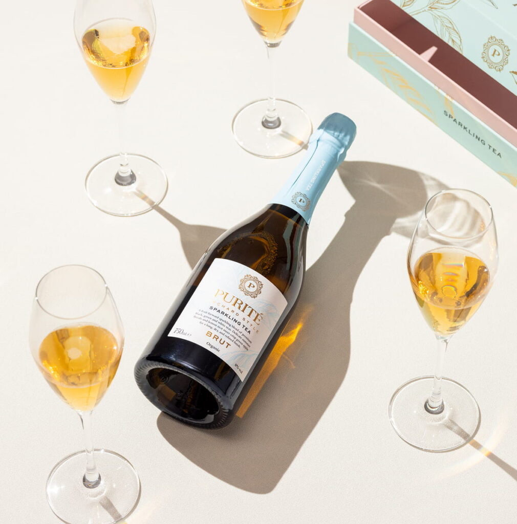 Orchard sparkling tea with four glasses
