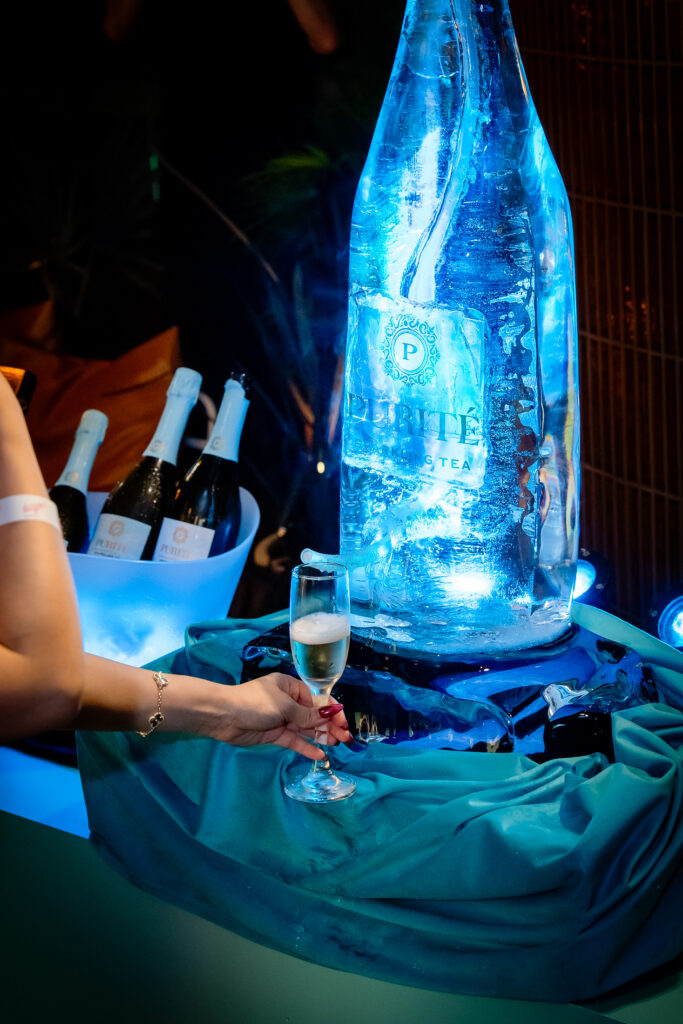 Purité ice sculpture with a glass of sparkling tea at the Hong Kong launch